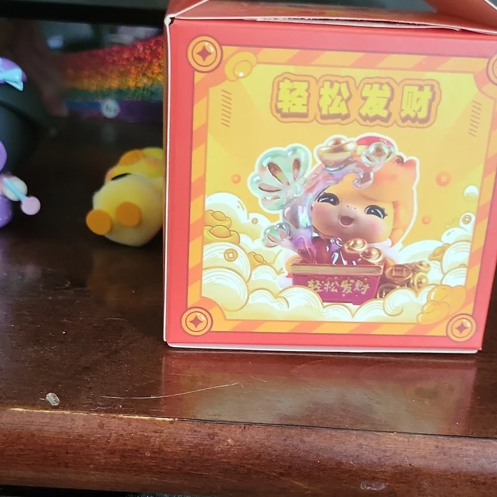 Chinese Collectible Figure with Red Drum, Lantern, Decorative Box